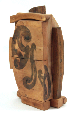 sculpture made from salvaged bits of wood chairs